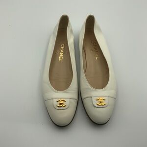CHANEL LOGO LEATHER FLATS